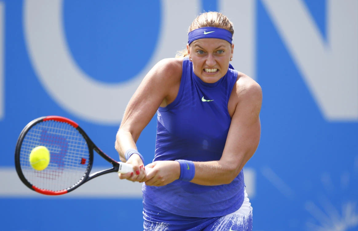 Czech Republic's Petra Kvitova in action against Czech Republic's Tereza Smitkova during the first round in the Aegon Classic at Edgbaston Priory Club, Birmingham, on Wednesday. (Reuters)