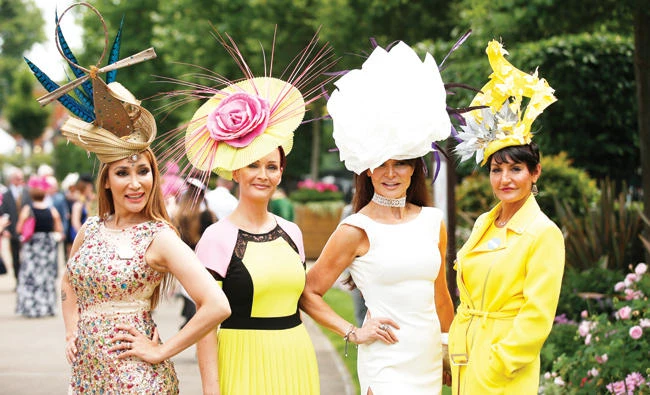 Royal Ascot racegoers pose before the races. (Reuters)
