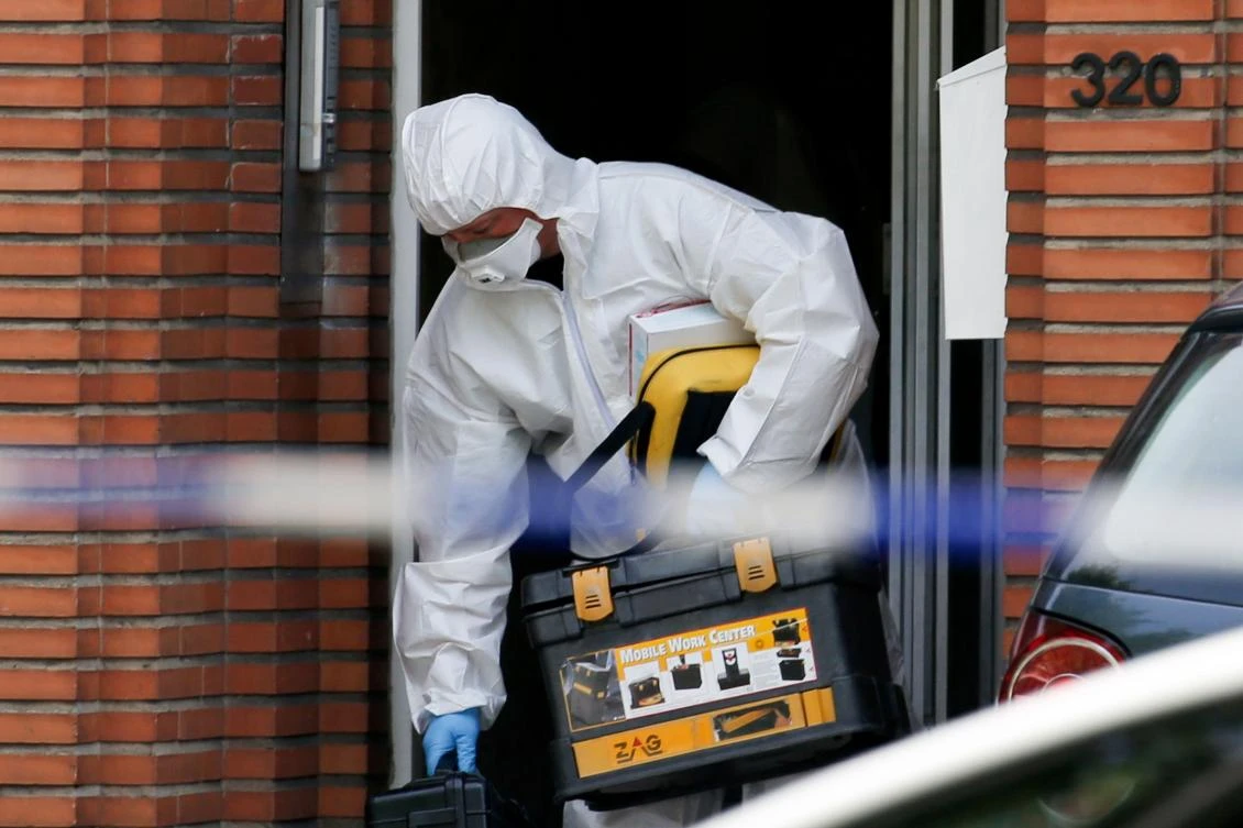 A forensic expert searches the house of the man who set off an explosion at one of Brussels' busiest railway stations in the neighbourhood of Molenbeek in Brussels, on June 21, 2017. Belgium said on June 21 a Moroccan man carried out a foiled terrorist attack with a nail bomb at a busy Brussels train station, the latest in a wave of attacks to hit Europe. The 36-year-old man, identified only as O.Z, shouted "Allahu Akbar" and tried to detonate a suitcase in a group of passengers at Brussels Central station before a soldier shot him dead on June 20. (AFP)