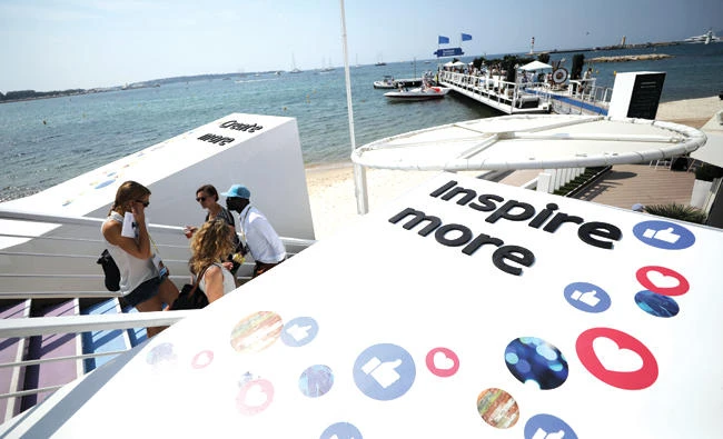 Logos of the social network Facebook are seen on a beach in Cannes, France, in this file photo. (Reuters)