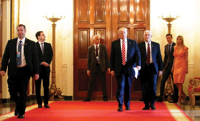 US President Donald Trump and Vice President Mike Pence arrive for an event
highlighting emerging technologies, in the East Room at the White House
in Washington on Thursday. (Reuters)