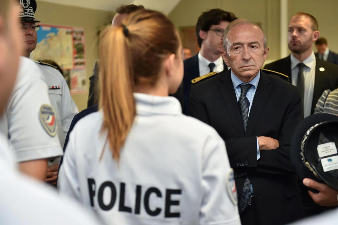 French Interior Minister Gerard Collomb talks to police during a visit in Calais on Friday. (AFP)