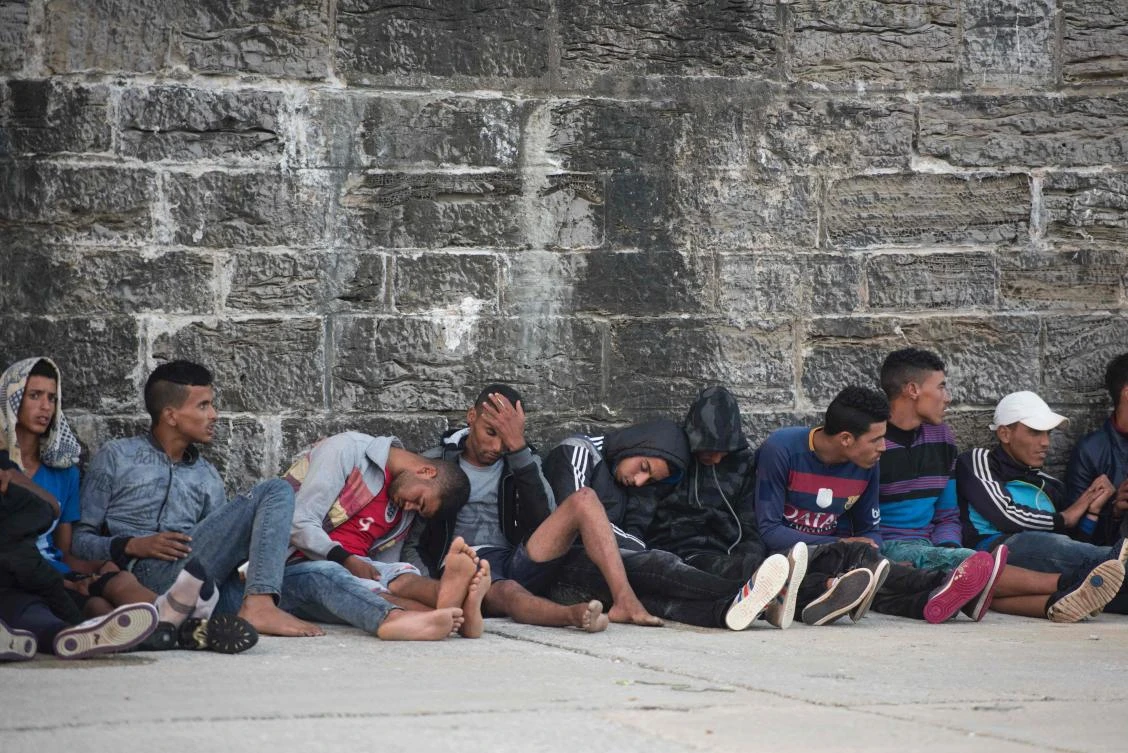 Refugees rest after they were rescued in the waters of the Strait of Gibraltar on Saturday.(AFP)