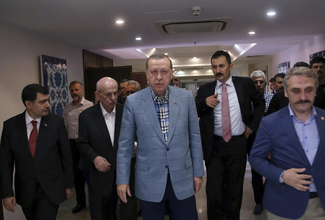 Turkey’s President Recep Tayyip Erdogan leaves a mosque after the Eid Al-Fitr prayers in Istanbul, early Sunday, June 25, 2017. Eid Al-Fitr marks the end of the Muslims’ holy fasting month of Ramadan.(AP)