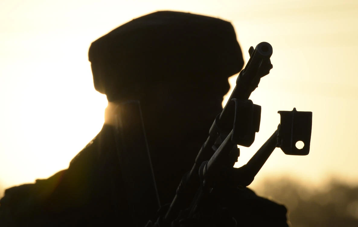 An Indian army personnel stands guard at the site of an attack by suspected rebels on a paramilitary vehicle at Pantha Chowk on the outskirts of Srinagar. (AFP)