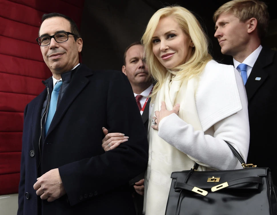 File photo: US Treasury Secretary-designate Stephen Mnuchin and his fiancee, Louise Linton. (Saul Loeb/Pool Photo via AP)