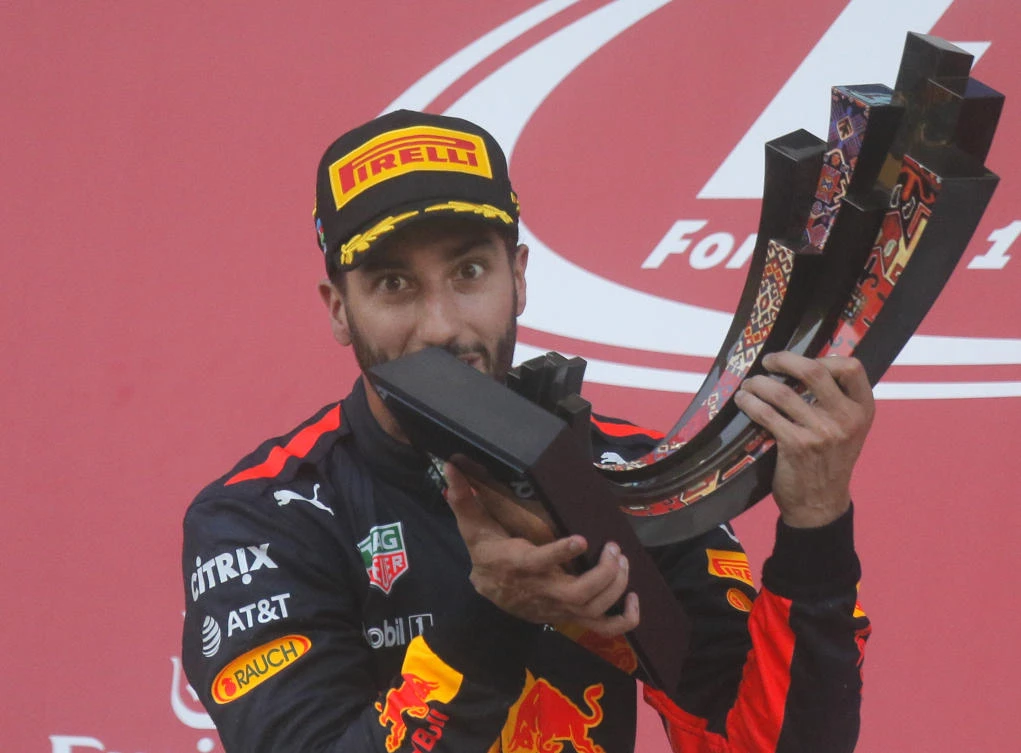 Red Bull driver Daniel Ricciardo of Australia holds the trophy on the podium after winning the Formula One Azerbaijan Grand Prix in Baku, Azerbaijan, Sunday. (AP)