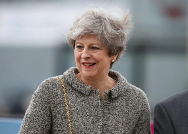 UK PM May’s strikes deal to get Northern Irish DUP support for minority government