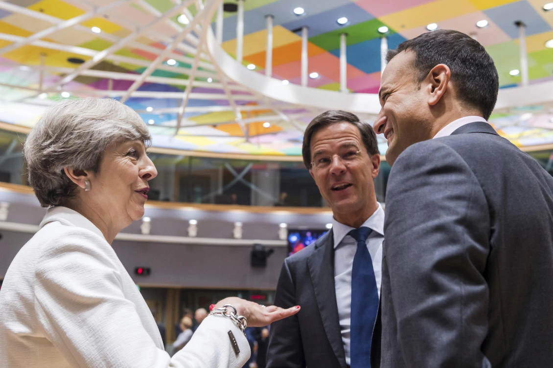 British Prime Minister Theresa May, left, speaks with Irish Prime Minister Leo Varadkar, right, and Dutch Prime Minister Mark Rutte during a round table meeting at an EU Summit in Brussels. (AP)