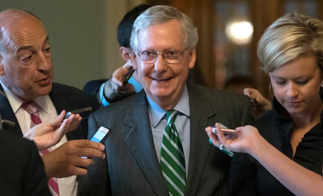 Reporters ask questions of Senate Majority leader Mitch McConnell. (AP)