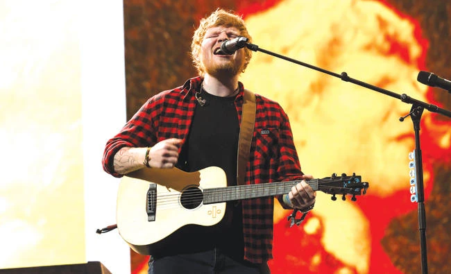 Singer Ed Sheeran performs at the Glastonbury Festival at Worthy Farm, in Somerset, England, on Sunday. (AP)