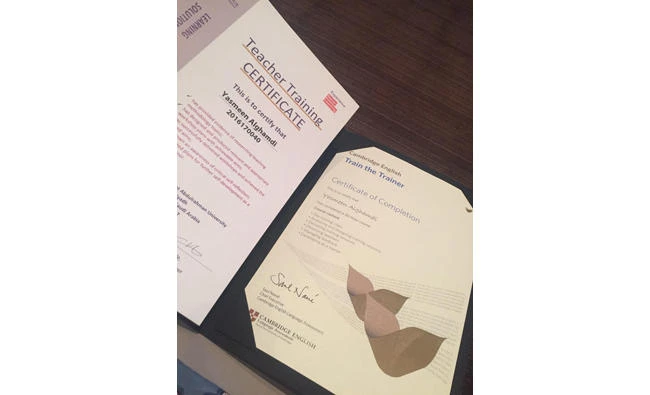 A photo, taken June 6, 2017, of the Cambridge train-the-trainer qualification certificate awarded to Yasmeen Alghamdi, an English language teacher, with the PNU English Language Program.