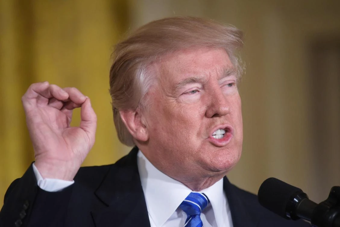 Trump declares victory as Supreme Court partially reinstates travel ban