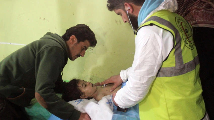 An unconscious Syrian child receives treatment at a hospital in Khan Sheikhoun, a rebel-held town in northwest Syria's Idlib province, after a suspected toxic gas attack on April 4, 2017. The attack killed dozens of civilians, including several children, in rebel-held northwestern Syria, a monitor said, with the opposition accusing the government and demanding a United Nations investigation. (AFP)