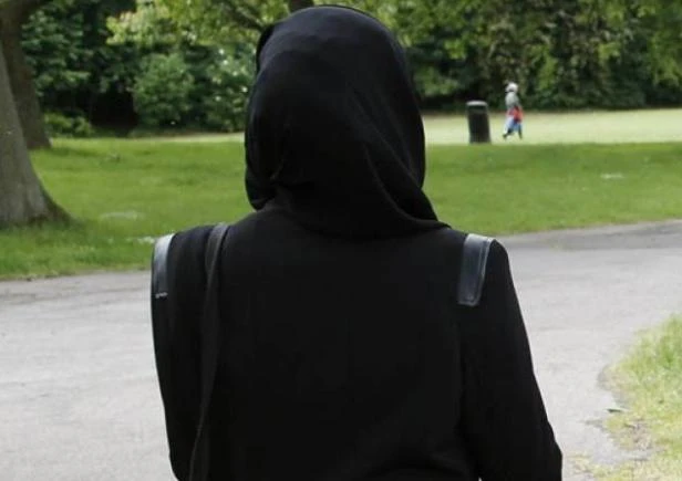 British school under fire over head scarf design (Reuters)