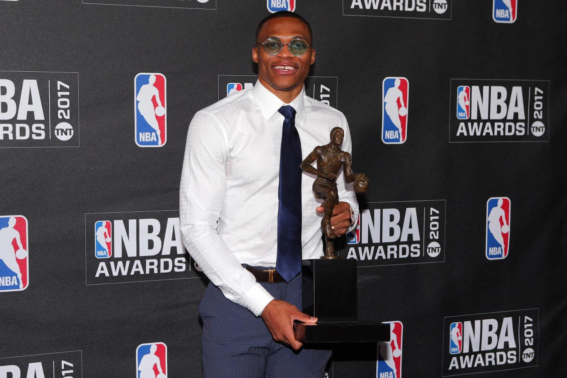 Oklahoma City Thunder player Russell Westbrook poses for photos with his 2017 NBA Most Valuable Player award during the 2017 NBA Awards at Basketball City at Pier 36 Monday. (USA TODAY Sports)