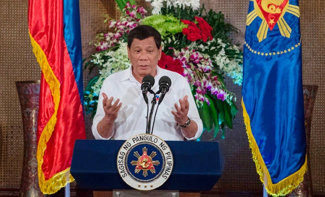 Philippine President Rodrigo Duterte gives a speech during Eid Al-Fitr celebrations at the Malacanang Palace in Manila on Tuesday. (AFP)