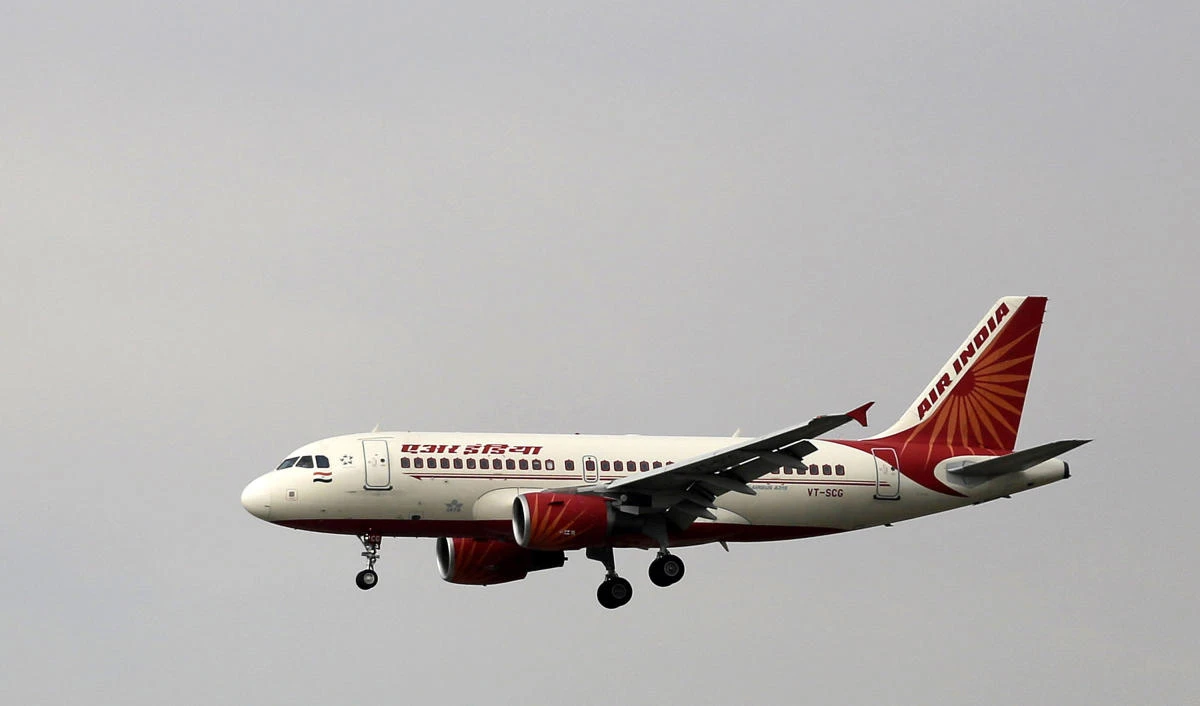 An Air India aircraft prepares to land at the Indira Gandhi International airport in New Delhi, India.. (AP Photo/Altaf Qadri, File)