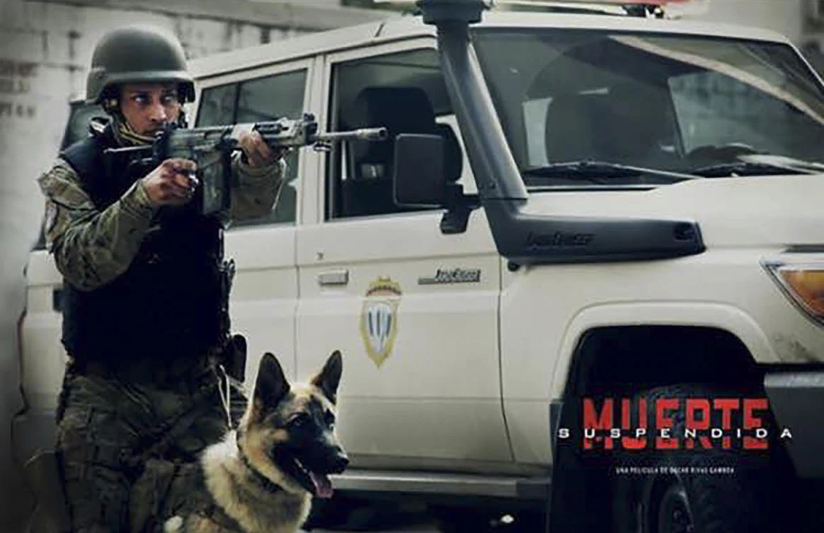 Picture released by OR producciones cine y TV showing a grab from 2015 Venezuelan movie 'Suspended Death' where ex-forensic officer Oscar Perez, identified by the police as the helicopter pilot who attacked the Supreme Court in Caracas features. (Handout by OR producciones cine y TV via AFP)