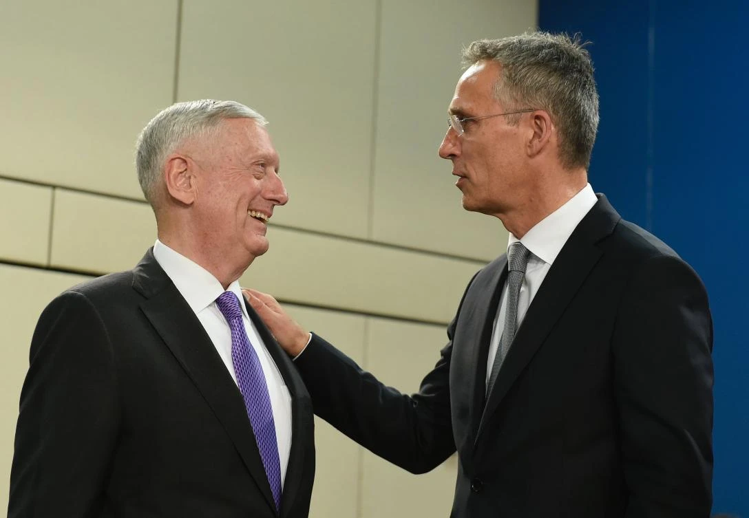 US Defence Secretary Jim Mattis (L) talks with NATO Secretary-General Jens Stoltenberg. (AFP)
