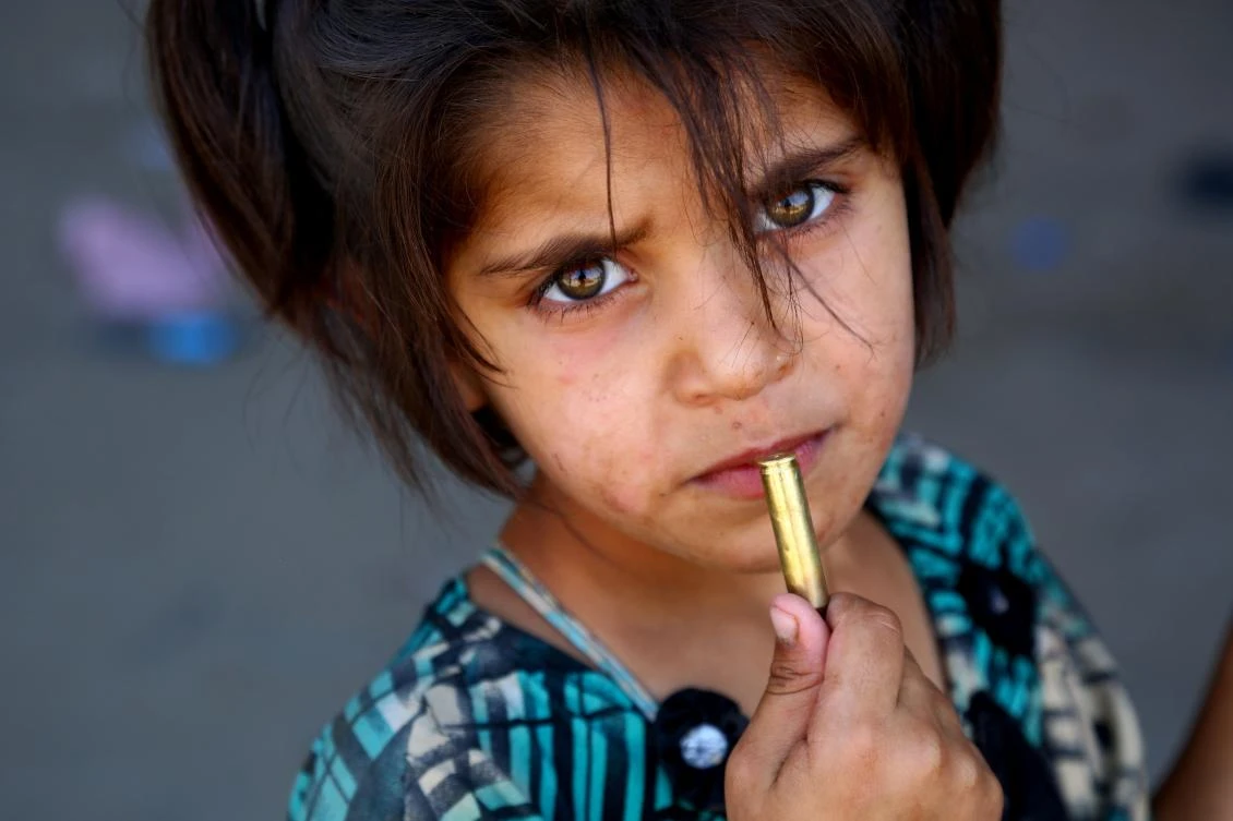 A Syrian girl, who fled areas under the Daesh group control in Raqqa. (AFP)