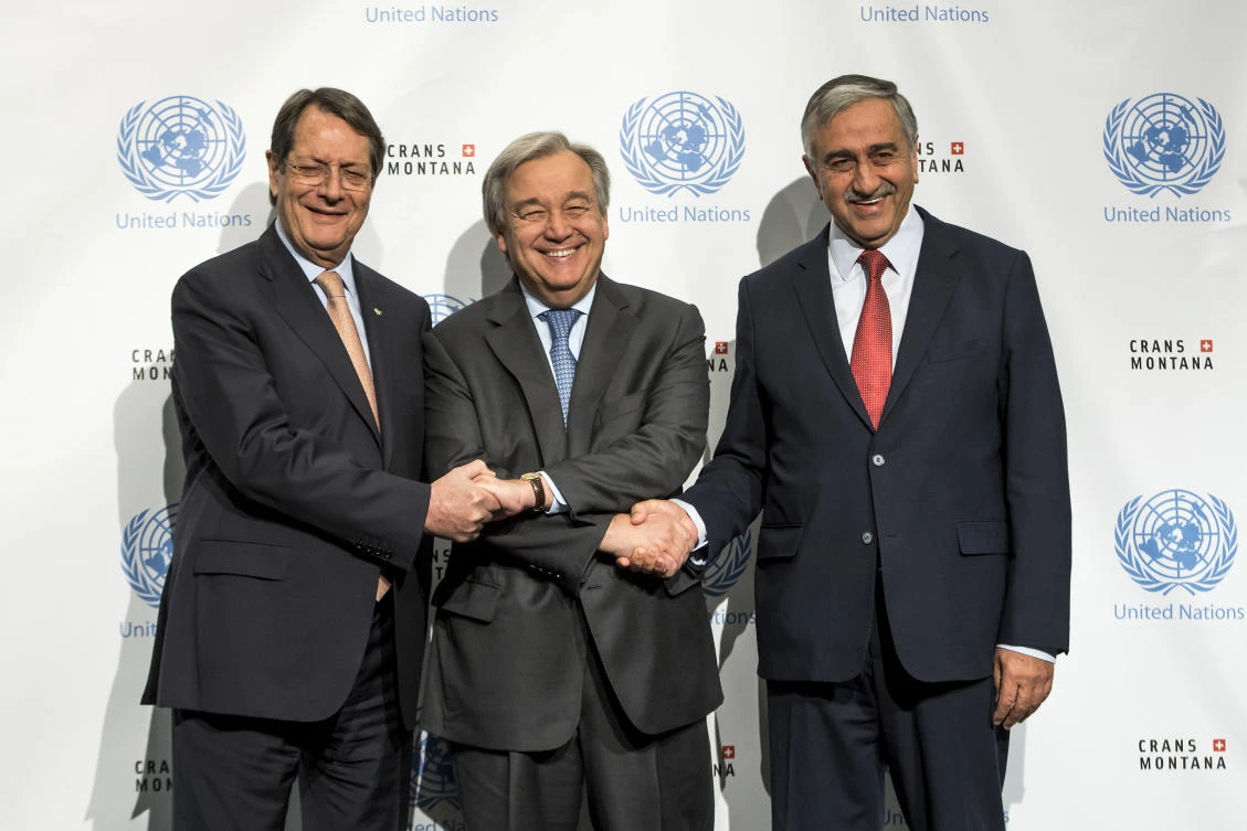 Greek Cypriot Leader Nicos Anastasiades, left, UN Secretary-General Antonio Guterres, center, and Turkish Cypriot Leader Mustafa Akinci, right, pose for a group picture during a new round of the conference on Cyprus under the auspices of the UN, in Crans-Montana, Switzerland on Friday. (AP)