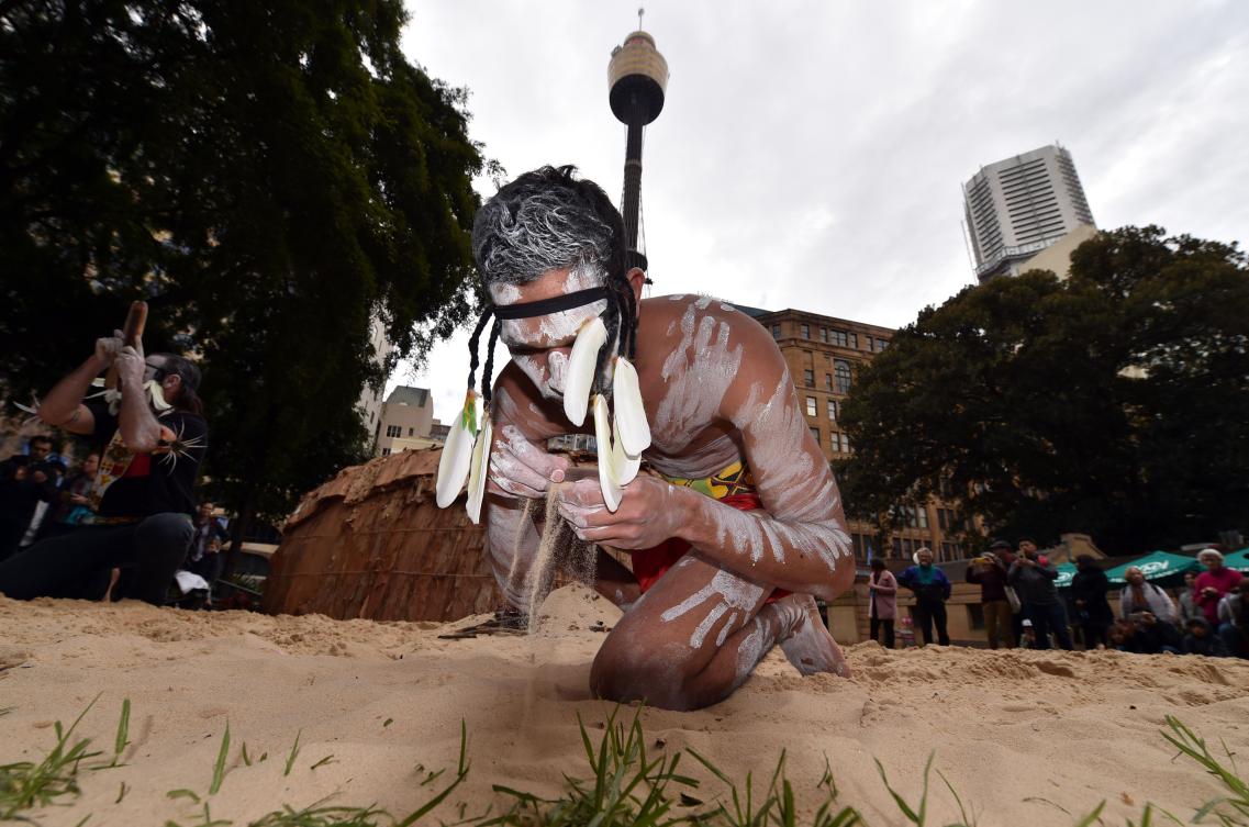 Traditional Aboriginal dancers perform at Sydney's Hyde Park on July 3, 2017. The week long annual event, with the theme of 'our languages matter', celebrates Aboriginal and Torres Strait Islander culture and takes place from July 3 in Hyde Park. / AFP / SAEED KHAN
