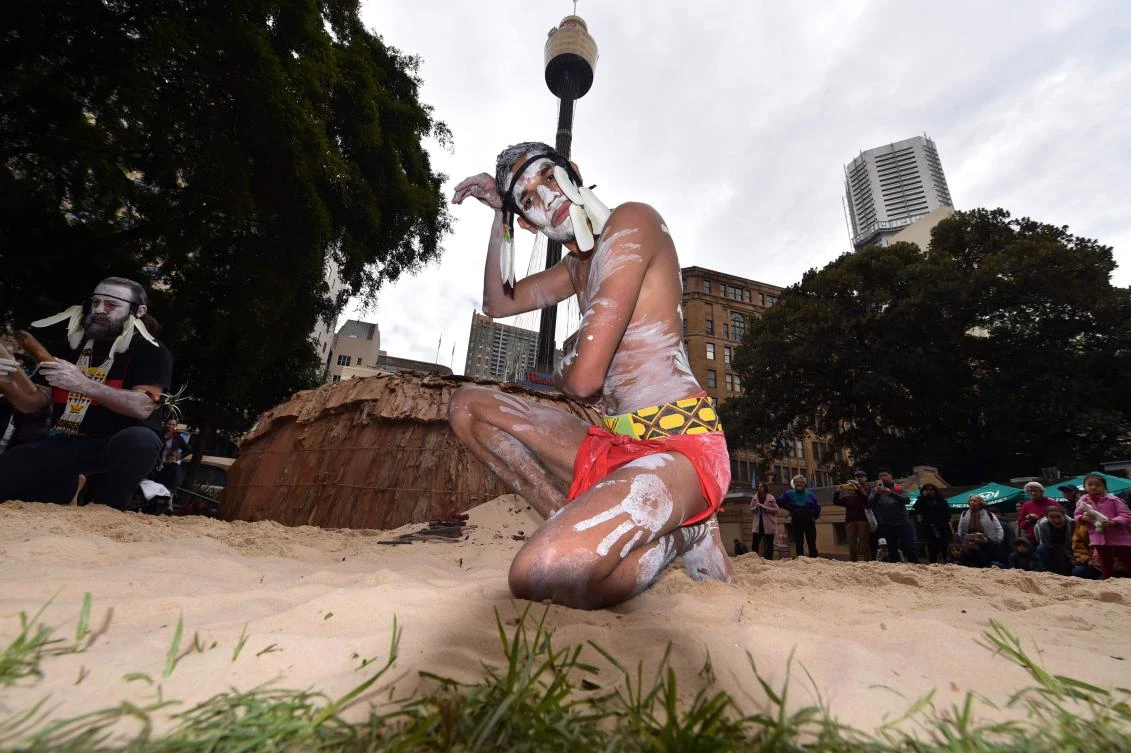 Traditional Aboriginal dancers perform at Sydney's Hyde Park on July 3, 2017. The week long annual event, with the theme of 'our languages matter', celebrates Aboriginal and Torres Strait Islander culture and takes place from July 3 in Hyde Park. / AFP / SAEED KHAN