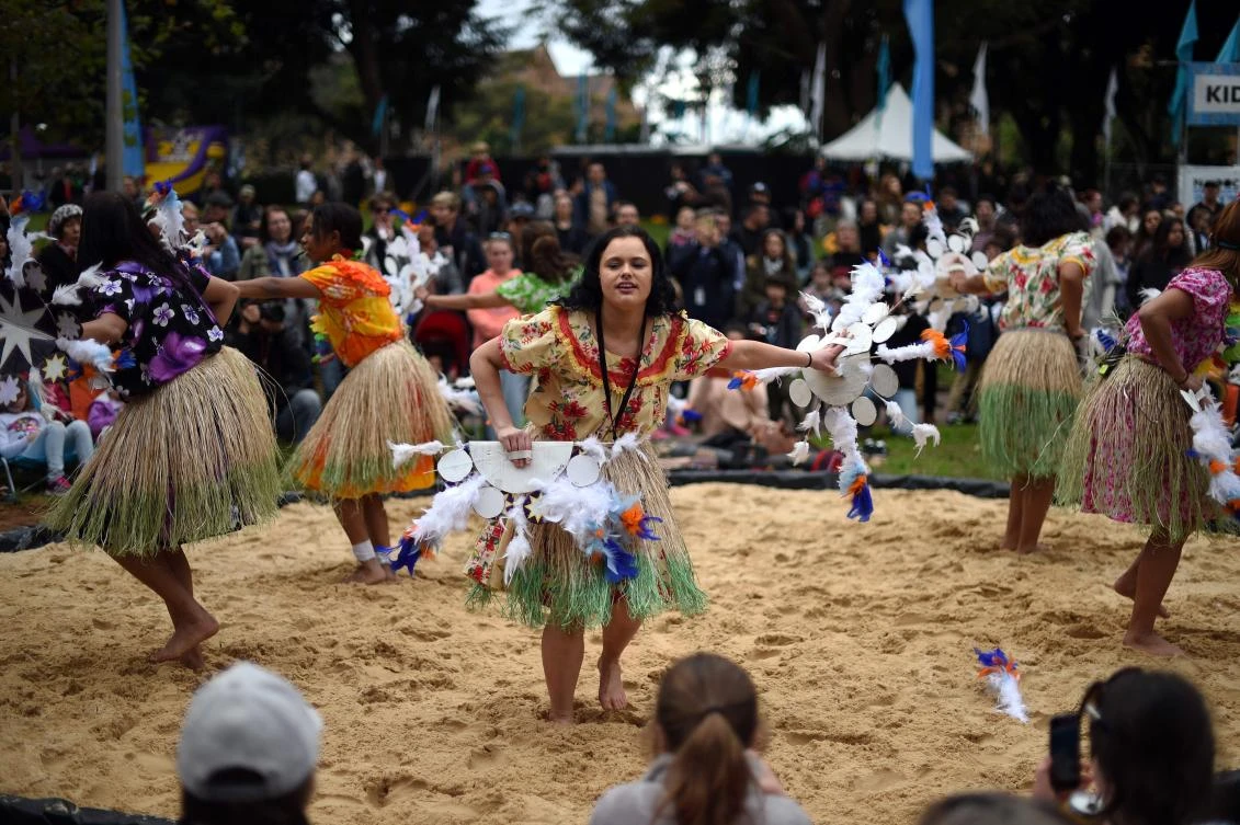 Participants perform a traditional Aboriginal dance at Sydney's Hyde Park on July 3, 2017. The week long annual event, with the theme of 'our languages matter', celebrates Aboriginal and Torres Strait Islander culture and takes place from July 3 in Hyde Park. / AFP / SAEED KHAN