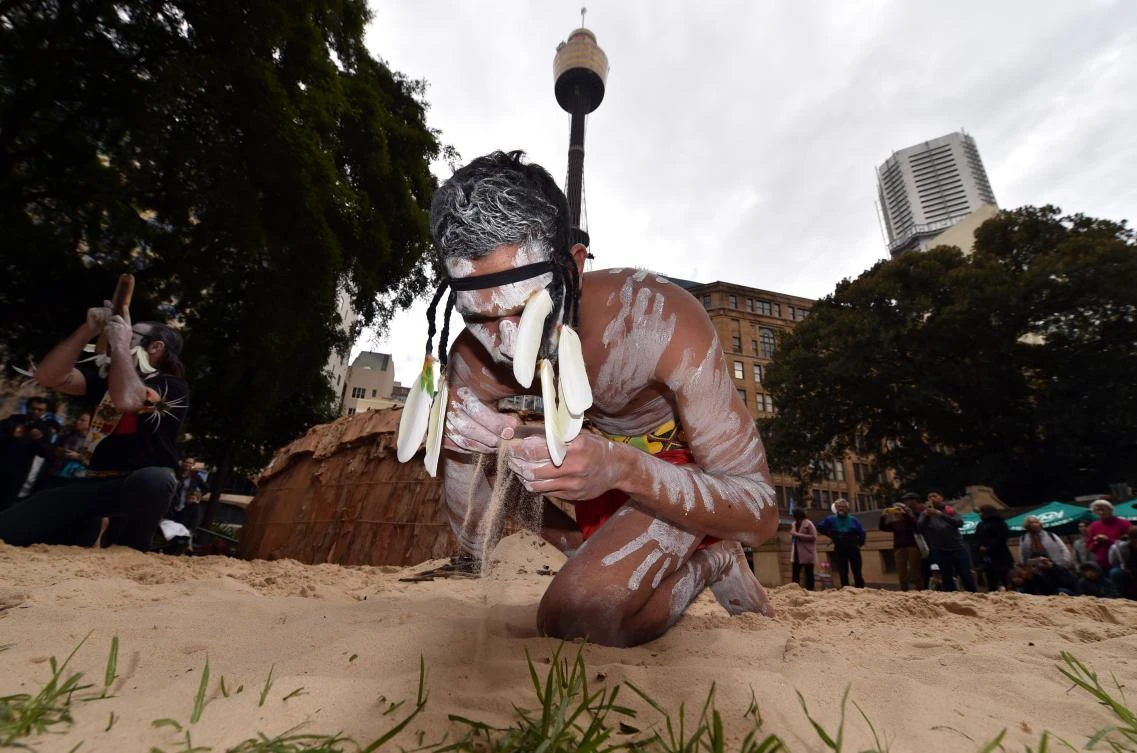 Traditional Aboriginal dancers perform at Sydney's Hyde Park on July 3, 2017. The week long annual event, with the theme of 'our languages matter', celebrates Aboriginal and Torres Strait Islander culture and takes place from July 3 in Hyde Park. / AFP / SAEED KHAN