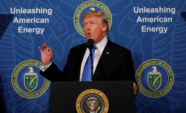 US President Donald Trump delivers remarks during an 'Unleashing American Energy' event at the Department of Energy in Washington on Thursday. (REUTERS/Carlos Barria)