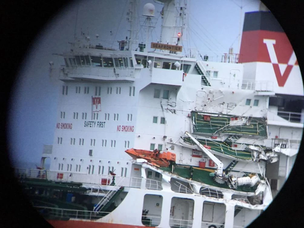 This handout picture taken and released by the French National Marine - Marine Nationale, on July 1, 2017 shows the damaged tanker Seafrontier following a collision with the cargo ship Huayan Endeavour in the waters between France and Britain. (AFP)