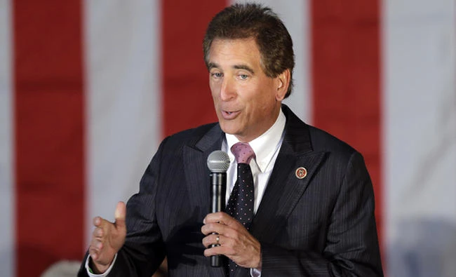 In this file photo, Rep. Jim Renacci, R-Ohio, speaks in Independence, Ohio. Churches should have the First Amendment right to endorse political candidates and still keep their tax-free status, say House Republicans, who quietly tucked a provision into a sweeping spending bill that would deny the IRS money to enforce the 63-year-old law prohibiting such outright politicking from the pulpit. (AP Photo/Mark Duncan)