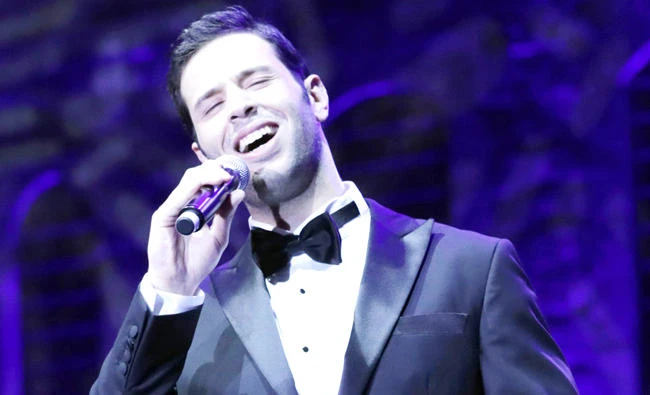 Palestinian singer Omar Kamal performs on stage at the Beiteddine Palace in Lebanon’s Chouf moutains, during the Beiteddine International Art Festival, on Saturday. (AFP)