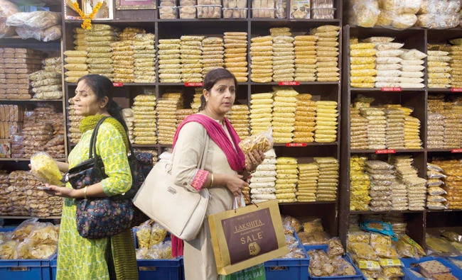 Shops and businesses reopened in India amid confusion Saturday, hours after the government introduced a new nationwide tax that will change the cost of nearly everything people buy. (AP)