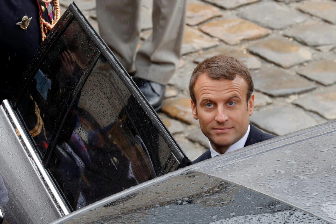 French President Emmanuel Macron enters his car at the end of a ceremony at the Invalides in Paris, France, June 30, 2017. (REUTERS)