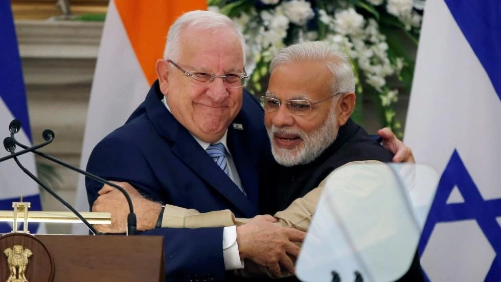 Israeli President Reuven Rivlin and India's Prime Minister Narendra Modi hug each other in New Delhi in 2016. Modi becomes the first Indian prime minister to visit Israel when he arrives on Tuesday. (Reuters)
