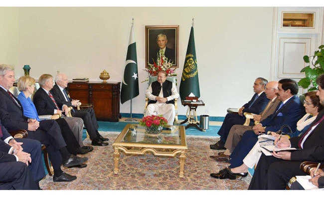 Pakistani Prime Minister Nawaz Sharif, center, with US Senator John McCain, fourth left, at Prime Minister House in Islamabad on Monday.(AFP)