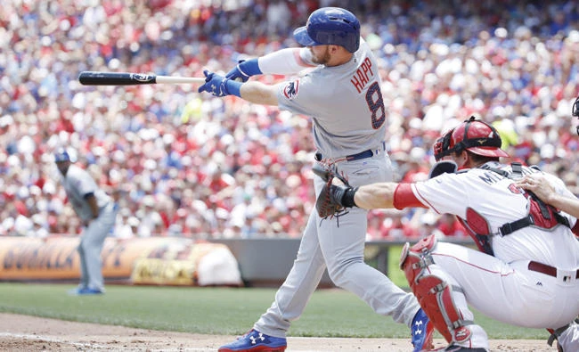 Ian Happ of the Chicago Cubs hits a two-run home run in the second inning of a game against the Cincinnati Reds at Great American Ball Park on Sunday in Cincinnati, Ohio. (AFP)