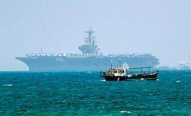 The aircraft carrier USS George H.W. Bush is seen moored in the Mediterranean Sea off the Israeli port of Haifa on July 1, 2017. The 1,092 feet (333 metres) carrier which can carry 6,000 personnel, is one of the world’s largest warships. (AFP)