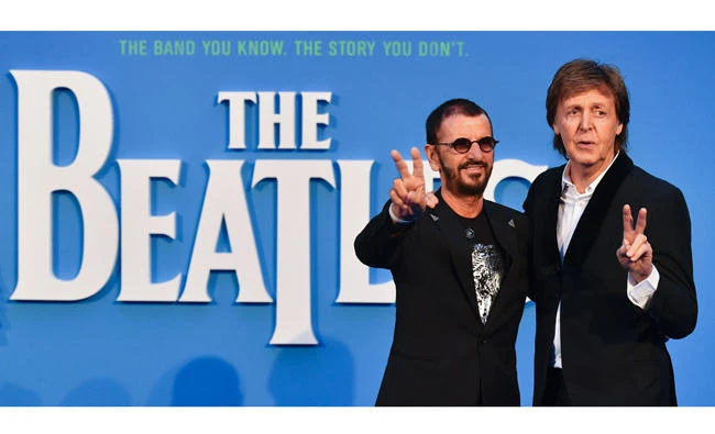 This file photo taken on September 15, 2016 shows British singer-songwriter Paul McCartney (R) and musician Ringo Starr (L) of legendary rock-band The Beatles posing on the carpet to attend a special screening of the film "The Beatles Eight Days A Week: The Touring Years" in London. (AFP file photo)