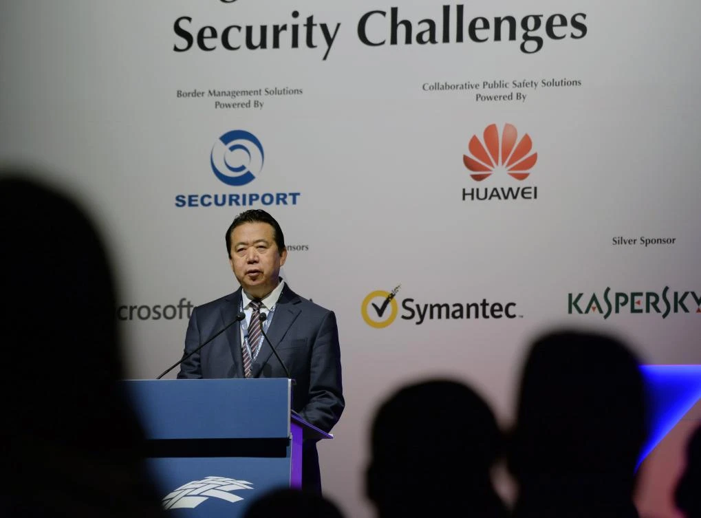 Meng Hongwei, president of Interpol, gives an addresses at the opening of the Interpol World Congress in Singapore on July 4, 2017. The three-day conference on fostering innovation for future security challenges is taking place from July 4 to 6. / AFP / ROSLAN RAHMAN