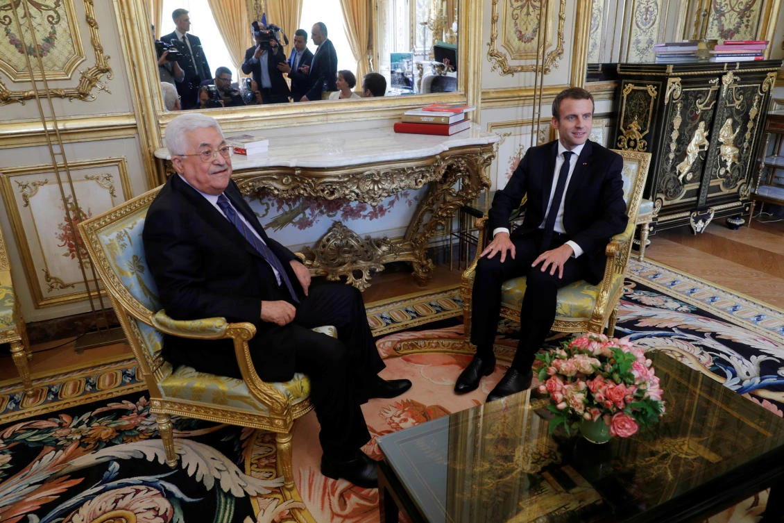 French President Emmanuel Macron and Palestinian President Mahmoud Abbas attend a meeting at the Elysee Palace in Paris, France, July 5, 2017. (REUTERS)