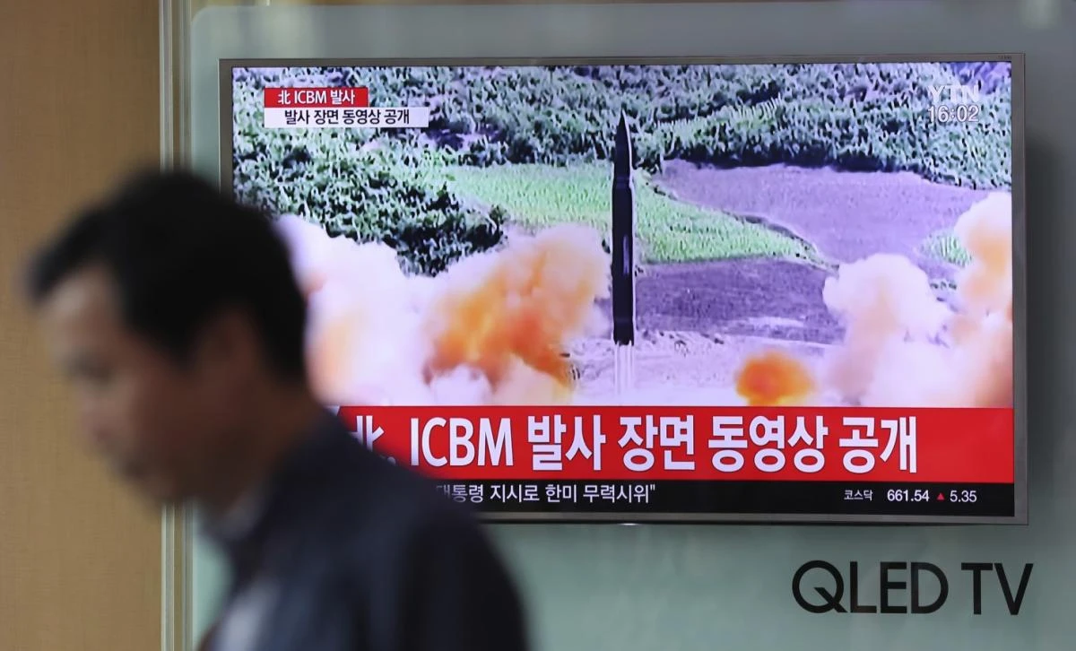 A man walks by a TV screen showing a local news program reporting about North Korea’s missile firing at Seoul Train Station in Seoul, South Korea, Wednesday, July 5, 2017. North Korea’s newly demonstrated missile muscle puts Alaska within range of potential attack and stresses the Pentagon’s missile defenses like never before. Even more worrisome, it may be only a matter of time before North Korea mates an even longer-range ICBM with a nuclear warhead, putting all of the U.S. at risk. (AP)