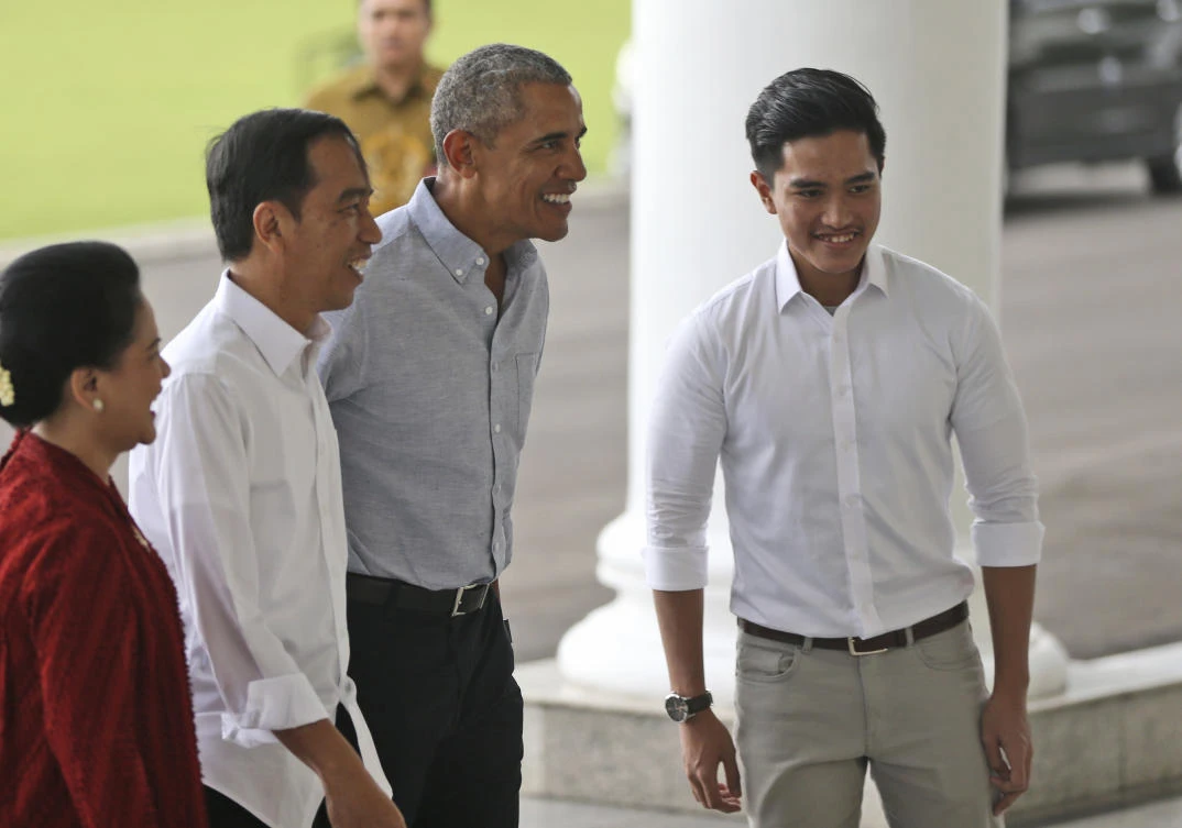 In this Friday, June 30, 2017, photo, former U.S. President Barack Obama, second right, walks with Indonesian President Joko Widodo, second left, his wife Iriana, and his youngest son Kaesang Pangarep during their meeting at Bogor Presidential Palace in Bogor, West Java, Indonesia. Indonesian police are investigating allegations of blasphemy and hate speech against Kaesang after receiving a complaint about a video uploaded to YouTube in May, Jakarta police spokesman Argo Yuwono said Thursday. (AP)