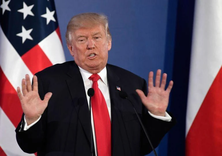 US President Donald Trump holds a joint press conference with his Polish counterpart at the Royal Castle in Warsaw, Poland, July 6, 2017. (AFP)