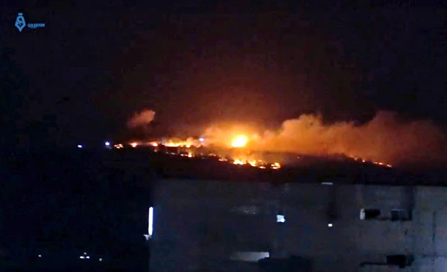 This frame grab from video on July 4, 2017, a Syrian opposition media outlet shows overnight shelling that struck in the Kurdish-controlled Parsa Mountain in the Azaz area of northern Aleppo, Syria. Syrian activists say Turkish forces and allied Syrian fighters have shelled northern Syrian villages controlled by a Kurdish militia, killing several people. (Qasioun, via AP)