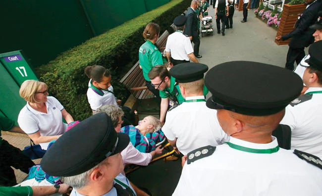 US player Bethanie Mattek-Sands is carried on a stretcher to an ambulance after suffering an injury during her women's singles second round match against Romania's Sorana Cirstea on the fourth day of the 2017 Wimbledon Championships at The All England Lawn Tennis Club in Wimbledon, southwest London, on Thursday. (AFP)