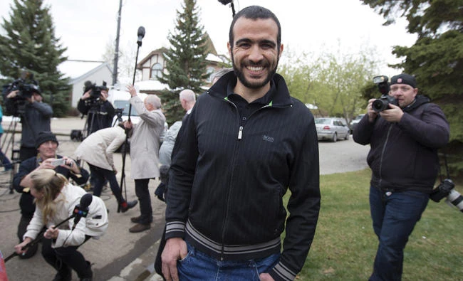 Omar Khadr leaves a news conference after being released on bail in Edmonton, Alberta, on May 7, 2015. Khadr, a Canadian, was once the youngest prisoner held on terror charges at Guantanamo Bay. (REUTERS/Todd Korol/File Photo)