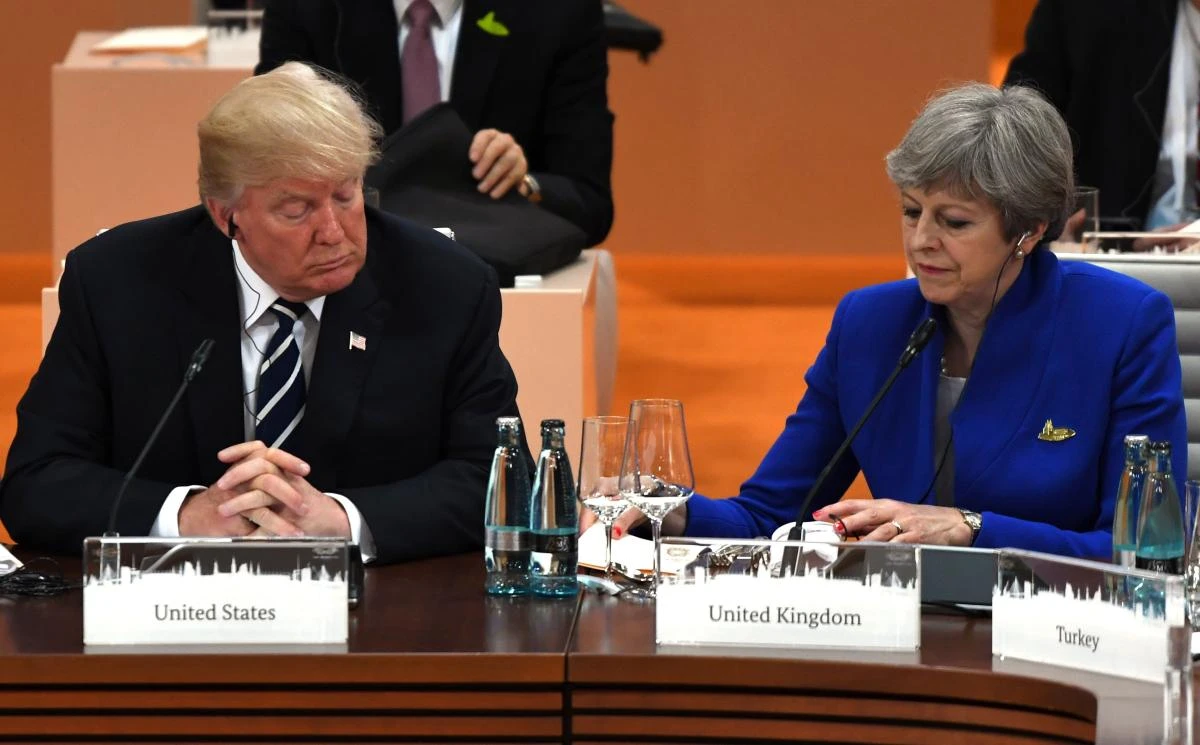 US President Donald Trump with Britain's Prime Minister Theresa May at a working session on the first day of the G-20 summit in Hamburg, northern Germany. (AFP)
